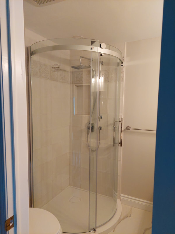 Newman Innovations bathroom walk-in shower